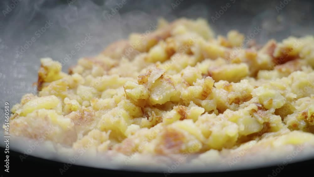Cooking roasted potatoes Röstkartoffel in a pan 4K Cooking roasted potatoes Röstkartoffel in a pan 4K