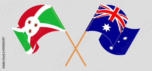Crossed and waving flags of Burundi and Australia