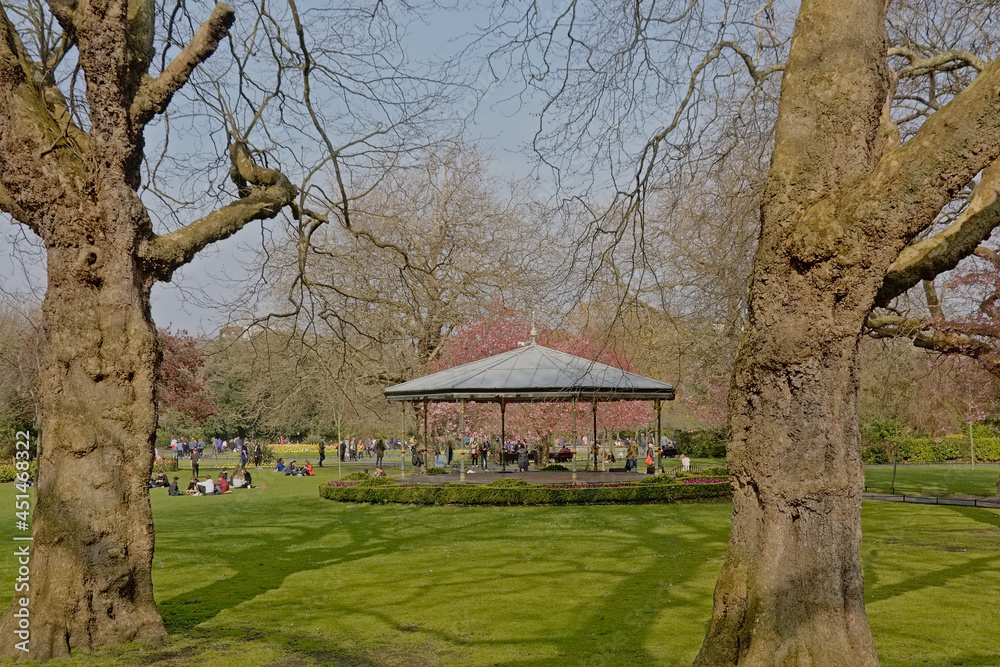 Lawn with bare oak trees and pavilon in Stephen`s Green park, Dublin Lawn with bare oak trees and pavilon in Stephen`s Green park, Dublin