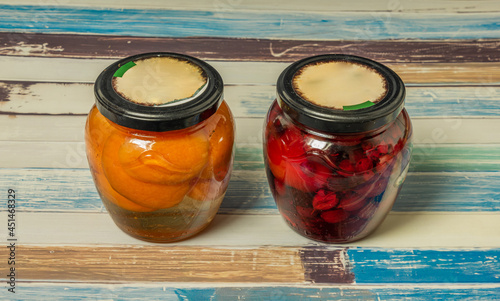 Fruit compote with apricot and gooseberry and more in glass photo