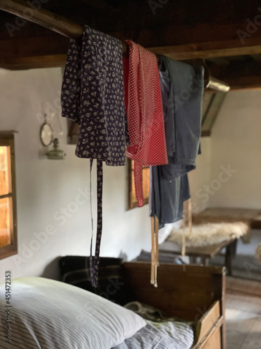 Skirts hanging on a rack in an old house
