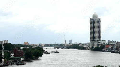 BANGKOK, THAILAND - Apr 05, 2019: A fast motion of Bangkok waterways and its traffic from morning to evening photo