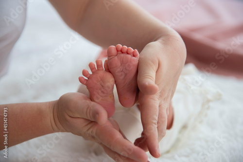 legs of a small child massage photo