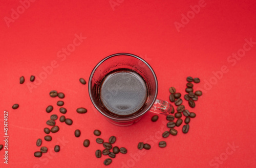 cup of coffee on red background 