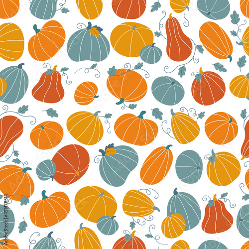 Seamless pattern with hand drawn doodle pumpkins and leaves. Flat style colorful vegetables. Design for Thankful day or Halloween celebration. Autumn vector illustration.