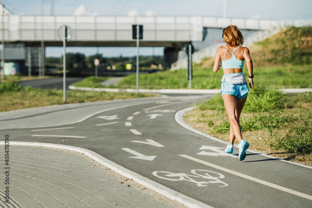 Middle Age Sportswoman Jogging Outdoor Middle Age Sportswoman Jogging Outdoor