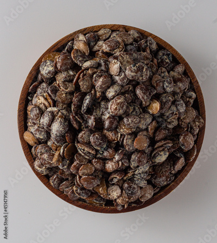 Photography African fermented locust beans (Iru, Dawadawa, Netetou), used as condiment in African cooking