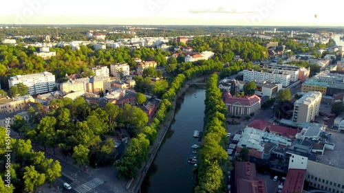 Fly over Aurajoki river in city center of Turku, Finland.