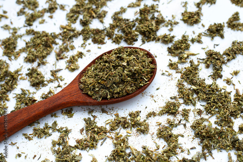 Dried absinthe wormwood on white background. photo