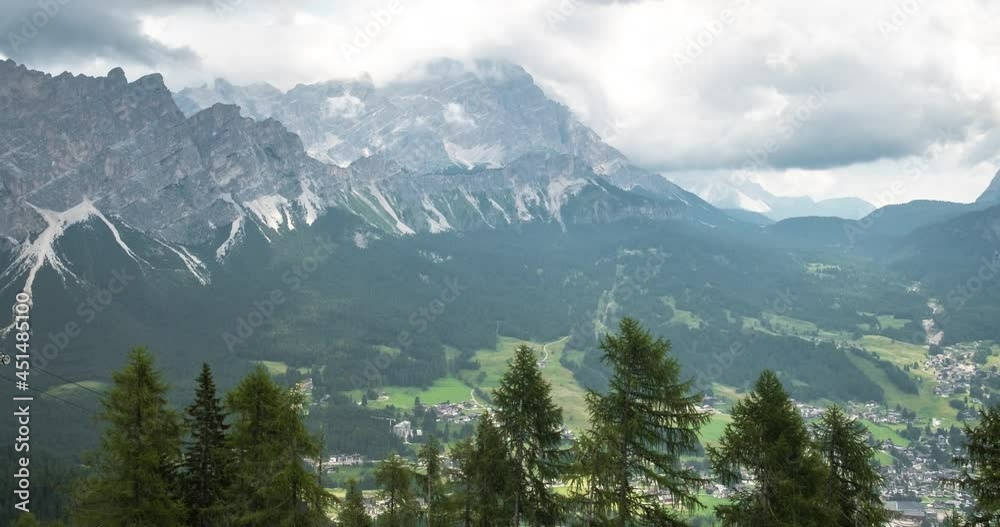 Timelapse 4k, Clouds in the Dolomites in Cortina D'Ampezzo in Veneto.
Summer mountain landscape Timelapse 4k, Clouds in the Dolomites in Cortina D'Ampezzo in Veneto.
Summer mountain landscape