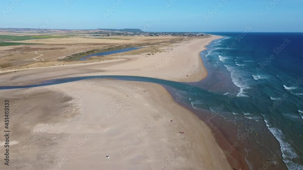 Aerial view with drone of the beach of Conil de la Frontera and the river Aerial view with drone of the beach of Conil de la Frontera and the river