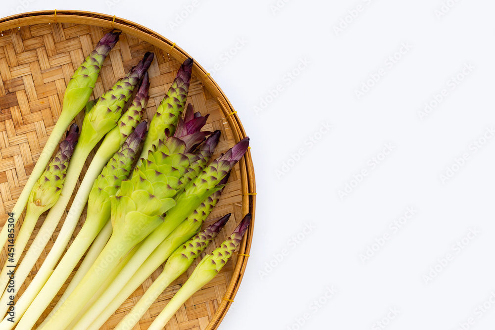 Curcuma sessilis flower in bamboo basket on white background. Curcuma sessilis flower in bamboo basket on white background.
