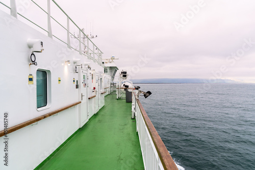 Deserted deck of a ferry in navigation on a cloudy day. Vestmannaeyjar, Iceland.