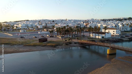 Aerial view with drone of the beach of Conil de la Frontera and the river