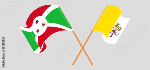 Crossed and waving flags of Burundi and Vatican