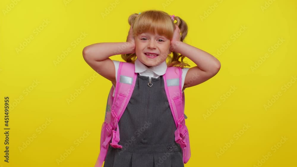 Oh my God, wow. Excited amazed little blonde teen child kid girl in school uniform raising hands in surprise looking at camera with big eyes, shocked by sudden victory. Back to school. Childhood Oh my God, wow. Excited amazed little blonde teen child kid girl in school uniform raising hands in surprise looking at camera with big eyes, shocked by sudden victory. Back to school. Childhood