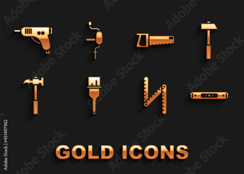 Set Paint brush, Hammer, Construction bubble level, Folding ruler, Claw hammer, Hand saw, Electric hot glue gun and drill icon. Vector