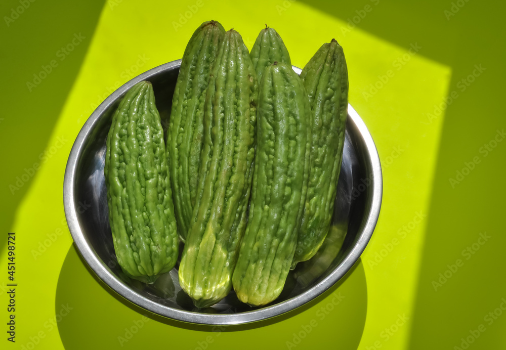 Bitter gourds in the container Stock Photo Adobe Stock