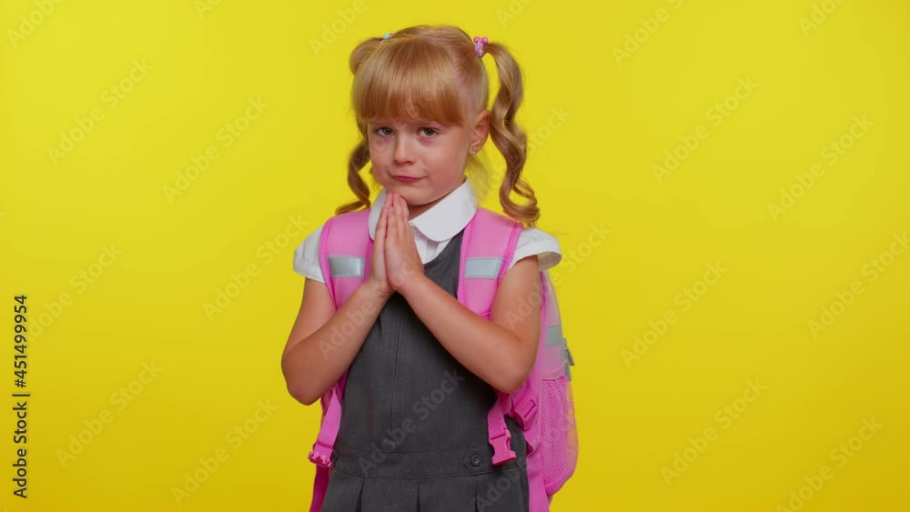 Please, God, forgive help me. Pupil girl teenage sincerely praying to God and looking up with pleading expression, begging apology, beseeching with hopeful face on yellow background. Back to school Please, God, forgive help me. Pupil girl teenage sincerely praying to God and looking up with pleading expression, begging apology, beseeching with hopeful face on yellow background. Back to school