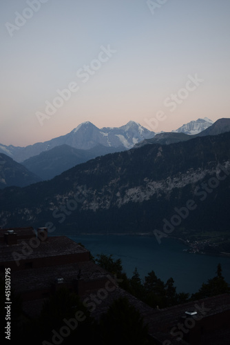 Beautiful shot of alpine mountains and lake at dawn