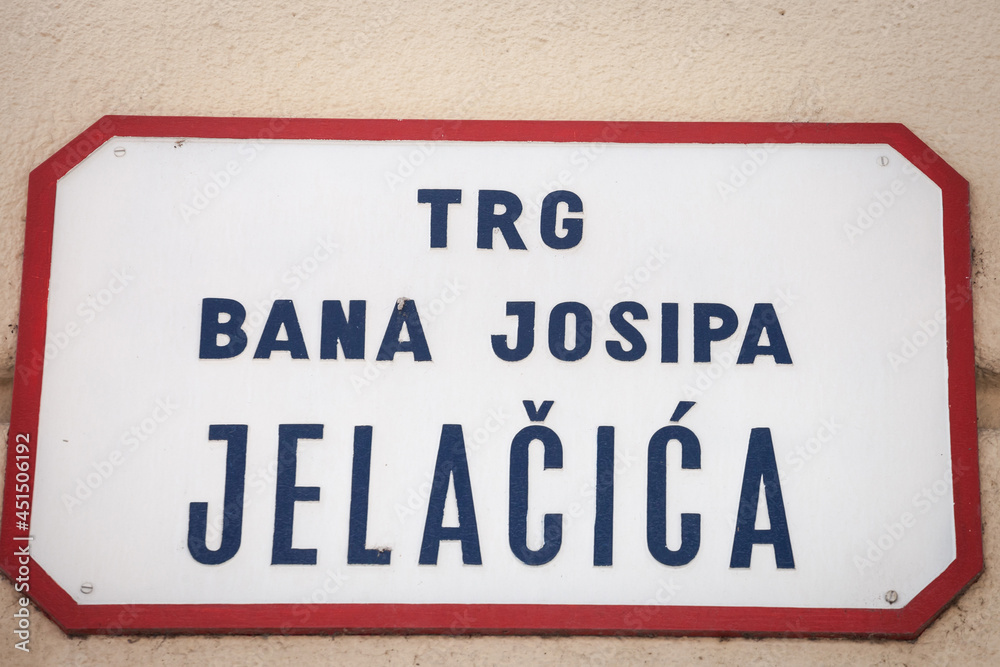 Street sign of Trg Bana Josipa Jelacica, meaning Ban Jelacic Square in Croatian language. an Jelacic square is the main square of downtown Zagreb and a major landmark.......