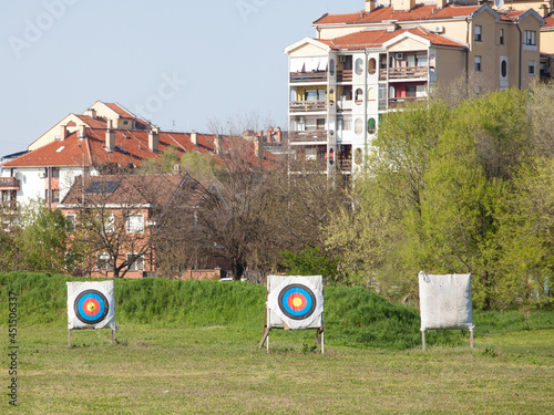 Archery target, also called bullseye target, in an archers field, used for practicing archery, outdoors... photo