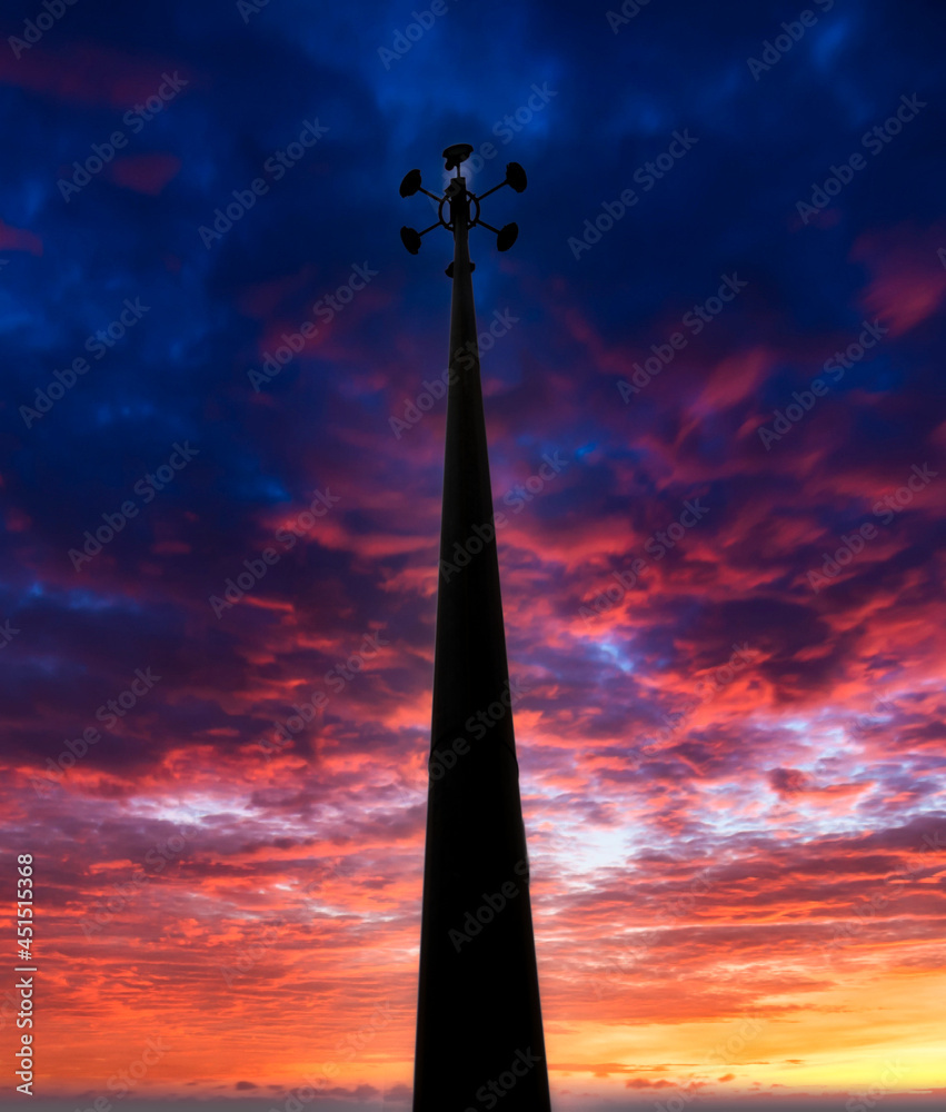Street light pole in sunset