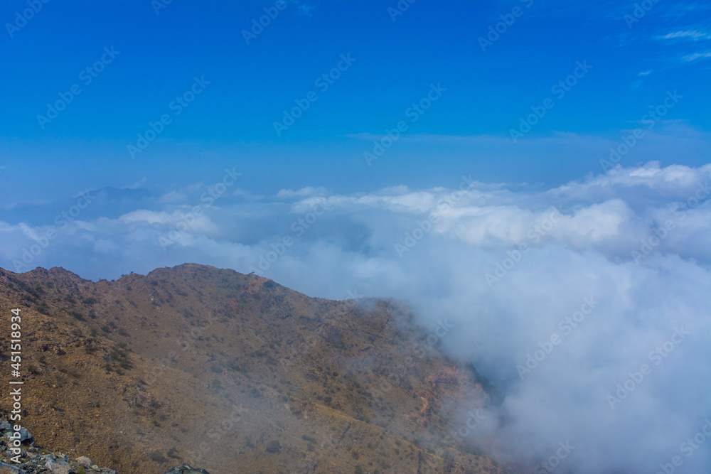 Mountain ridge in the clouds