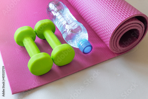 Dumbbells on background. The concept of a healthy lifestyle. photo