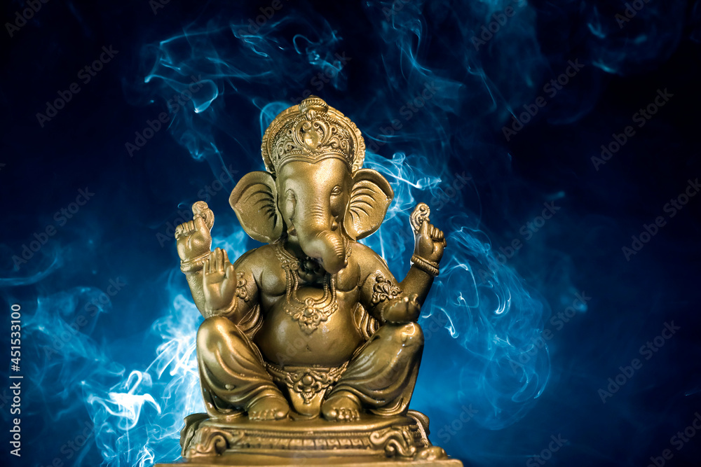 Golden lord ganesha sclupture over dark background. celebrate lord ganesha  festival. Stock Photo | Adobe Stock