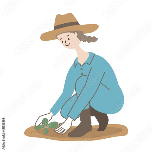 苗を植える女性