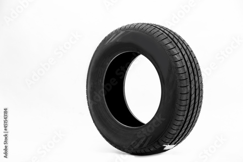 New car tire on white background.