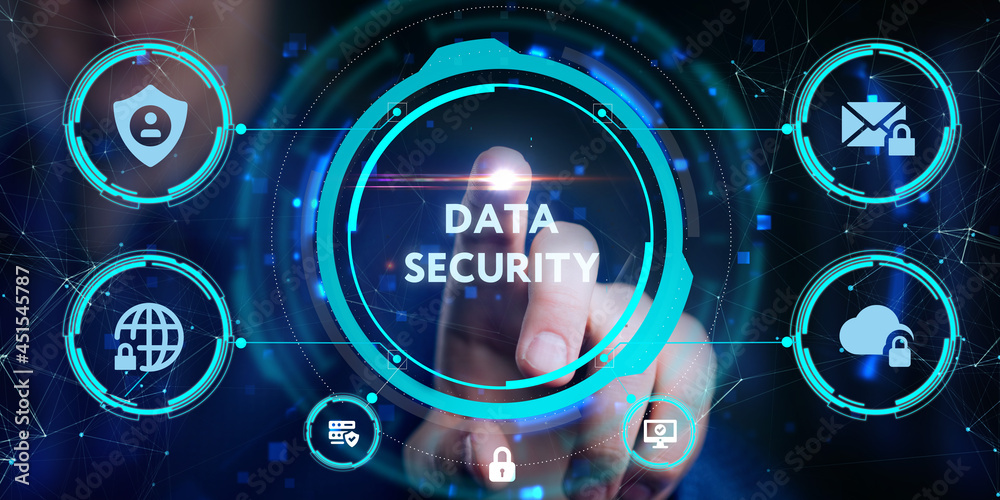 Fototapeta premium Cyber security data protection business technology privacy concept. Young businessman select the icon Data security on the virtual display.