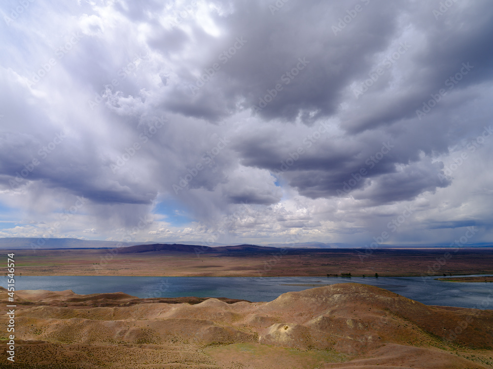 The Columbia River flows through a barren landscape in the Saddle Mountain National Wildlife Refuge in Washington, USA