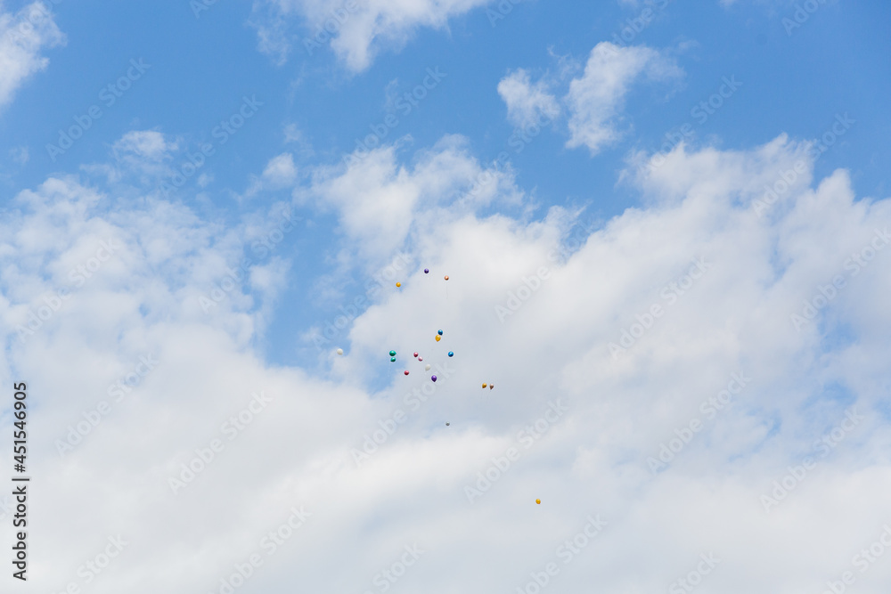 Fototapeta premium multi-colored balls in the blue sky