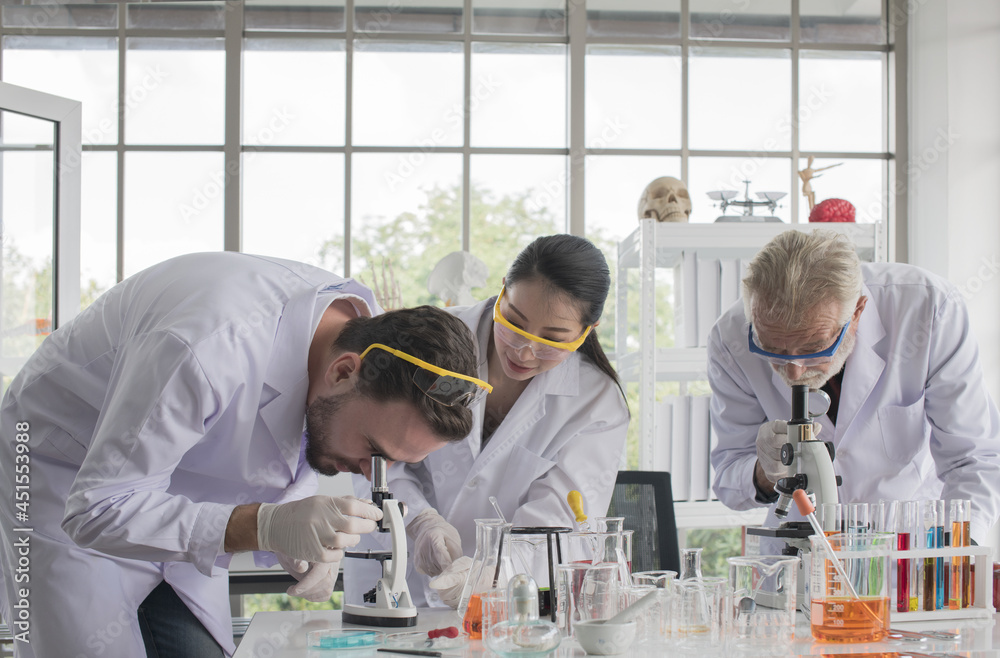 Team Doctor while working analysis lab . Concept for Team and Teamwork concept . Team Doctor while working analysis lab . Concept for Team and Teamwork concept .