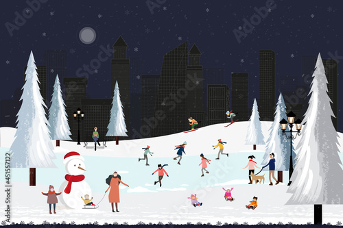 Panorama city in winter holidays landscape, Happy crowd people celebrating in the city park on Christmas Eve, Winter landscape at night with people having fun hang out in new year