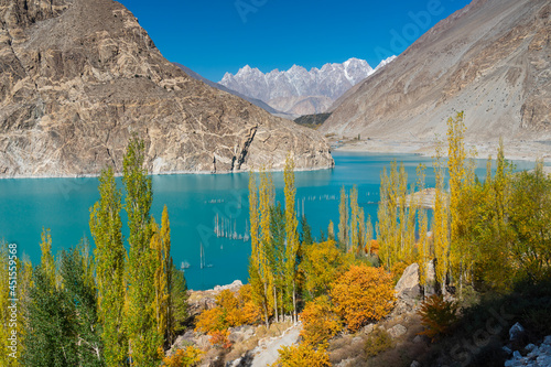 Attabad lake in a beautiful autumn season with Passu cathedral mountains massif in background, Karakoram mountains range in Pakistan