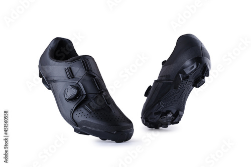 Front and beneth of black MTB cycling shoes isolated on white background. Studio shot