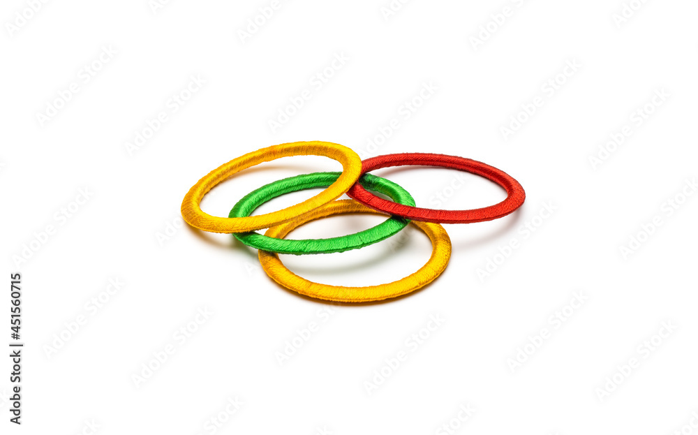 Colorful women bangles on an isolated white background Colorful women bangles on an isolated white background