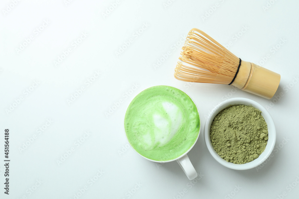 Matcha latte and accessories for making on white background Matcha latte and accessories for making on white background