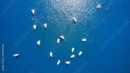 Drone view of river and boats at summertime.