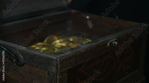 treasure chest with gold coins, smoke from inside