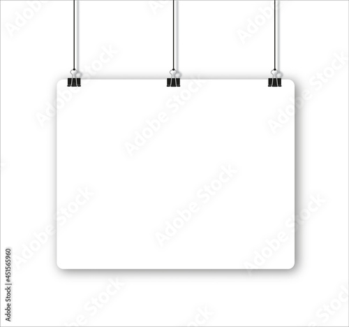 paper sheet with shadow in A4 format and black paper clip