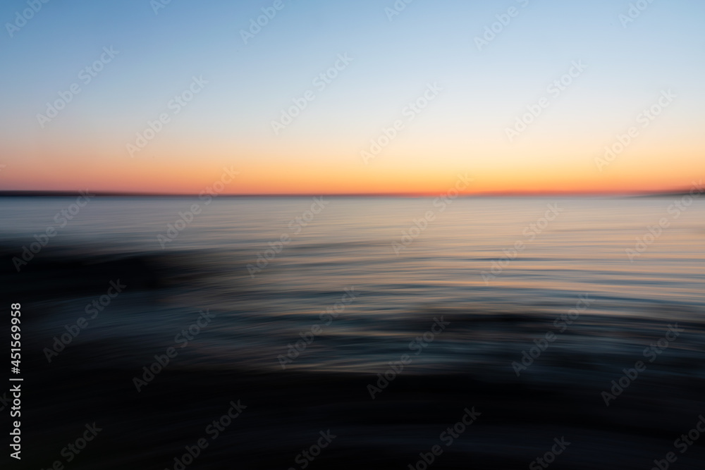 Obraz premium abstract icm landscape photo of sunset over the sea