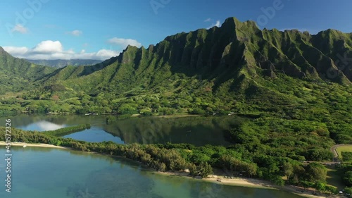 Aerial view of the ancient Moli'i fishponds with  reflections of the Koolau mountains in the ponds. The ponds are located near Kaneohe, on the island of Oahu, Hawaii, USA. 