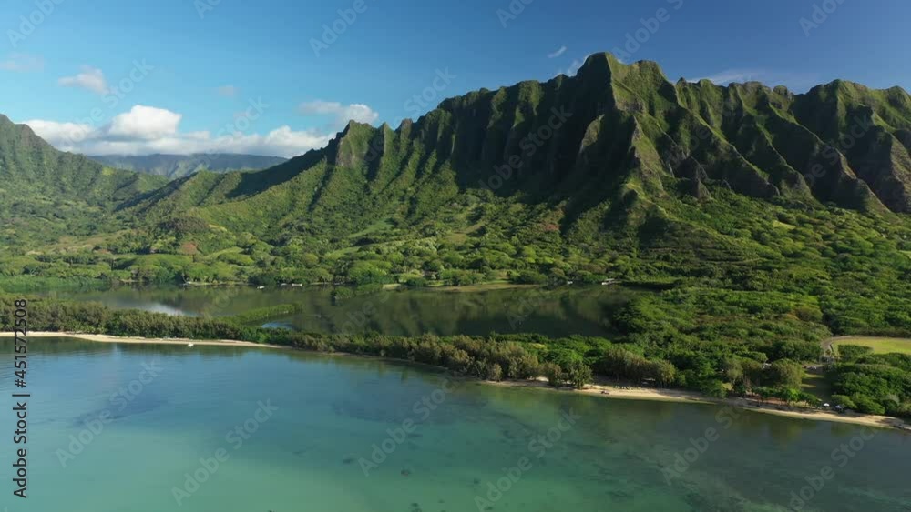 Aerial view of the ancient Moli'i fishponds with reflections of the Koolau mountains in the ponds. The ponds are located near Kaneohe, on the island of Oahu, Hawaii, USA. Aerial view of the ancient Moli'i fishponds with reflections of the Koolau mountains in the ponds. The ponds are located near Kaneohe, on the island of Oahu, Hawaii, USA.