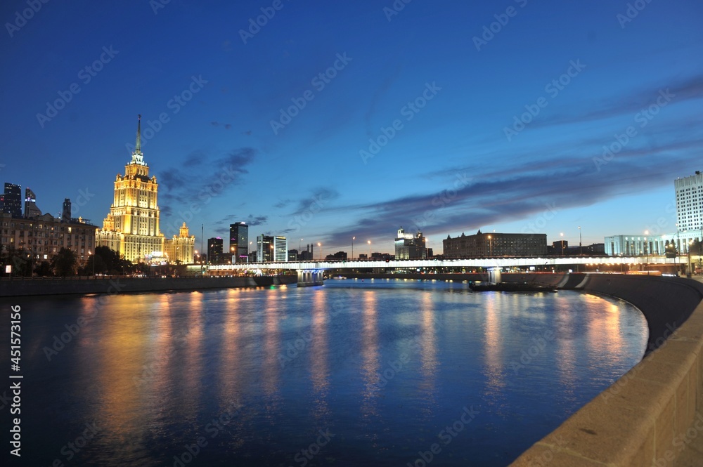 hotel Ukraine in night Moscow and the embankment of the White House, Moscow river