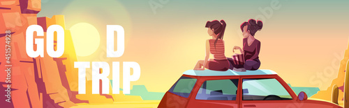 Poster with girls sitting on car roof in desert