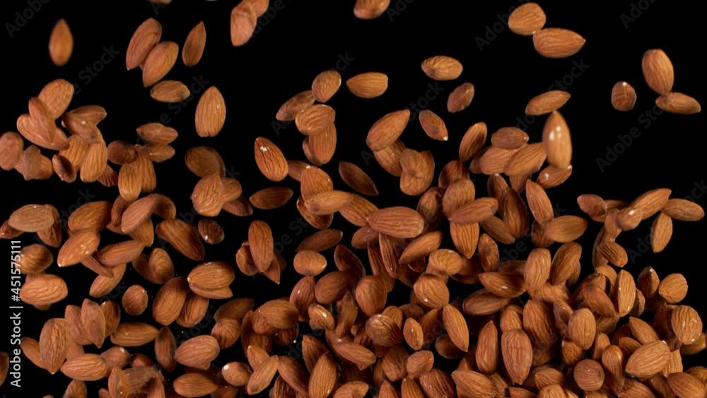 Super Slow Motion Shot of Flying Natural Unsulphurised Almonds. Filmed on High Speed Cinematic camera at 1000 fps. Super Slow Motion Shot of Flying Natural Unsulphurised Almonds. Filmed on High Speed Cinematic camera at 1000 fps.